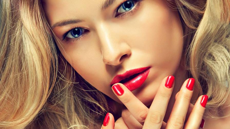 Blonde With Matching Manicure And Lipstick