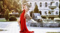 Girl Wearing Red Dress In Park